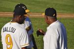 Tony-O talking baseball with Ballou and Gonzalez.
