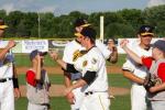 Young ballplayers sharing some high fives with the Stingers.