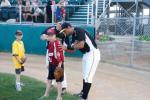 2011 All Star Eduardo Gonzalez signs an autograph for a fan.